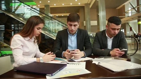 Team of young creative people are discussing a work project Stock Footage 74304669
