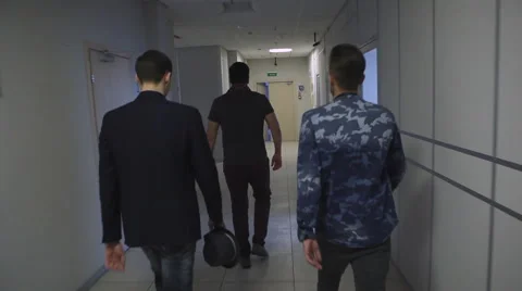 The Team of Young Designers Walk Through the Business Center Stock Footage 61053304