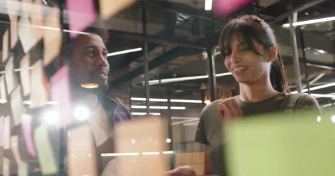 Team of young developers brainstorming, looking for creative ideas and writing Stock Footage 159770438