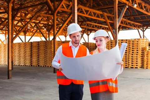 Team of young engineer and architects discussing new plan Stock Photos
