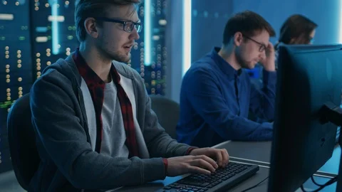 Team of Young IT Programers Working on Desktop Computers in Data Center System Stock Footage 103275645