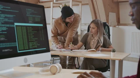 Team of Young Web Designers Working in Office Stock Footage 143326244