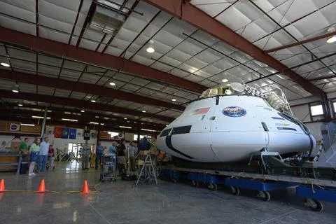 Teams peform Orion Parachute Test Vehicle (PTV) loading operations Stock Photos