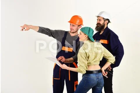 Teamwork in action. Professional people working on construction design. Men and Stock Photos