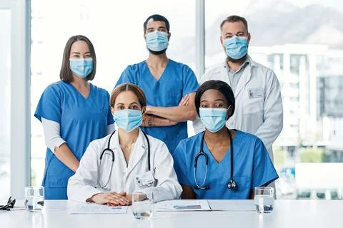 Teamwork allows us to cut down on medical errors. Portrait of a group of medi Foto stock