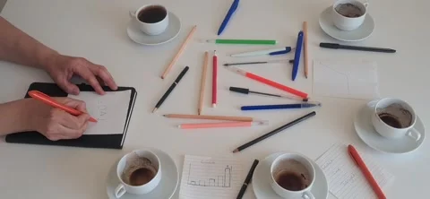 Teamwork and goal setting strategy with handwritten paper in office workspace 動画素材 333793478
