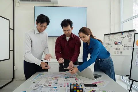 Teamwork and Prototyping. Designers collaboratively developing UX solutions 스톡 사진