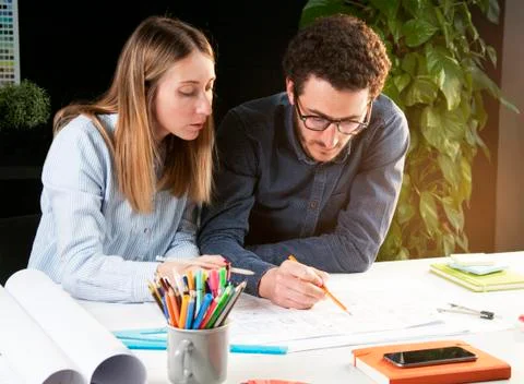 Teamwork architects working in office at house project Stock Photos