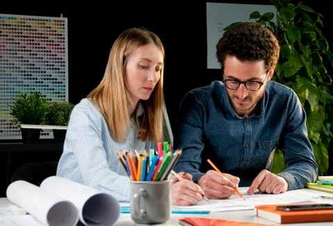 Teamwork architects working in office at house project Stock Photos