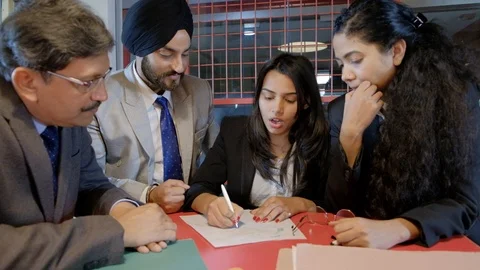 Teamwork between smart sophisticated colleagues working and getting suggestion f Stock Footage 102322453