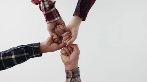Teamwork in business.  Bumping fists helping hand symbol. Bumping fists is an Stock Footage 201660077