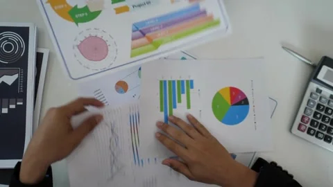 Teamwork business planning concept unrecognized charts, diagrams, papers, Video stock 256739365