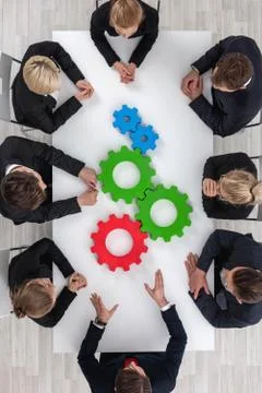 Teamwork with cogs of business Stock Photos