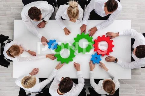 Teamwork with cogs of business Stock Photos