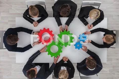 Teamwork with cogs of business Stock Photos