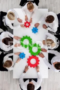 Teamwork with cogs of business Stock Photos