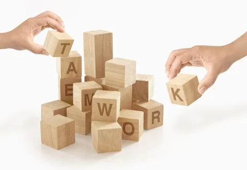 Teamwork &amp; collaboration concept on isolated background. Stock Photos