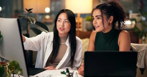 Teamwork, computer and pointing with business people in office for tech startup Stock Photos