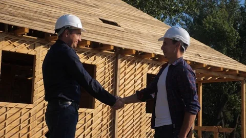 Teamwork. concept building constructing architect slow motion video. two men Stock Footage 115983160