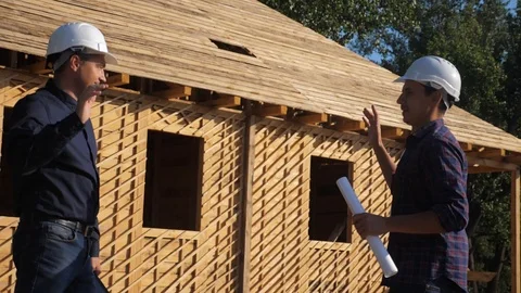 Teamwork. concept building constructing architect slow motion video. two men Stock Footage 115983256