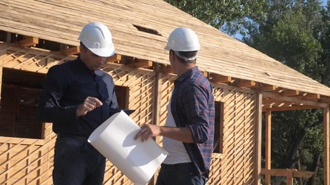 Teamwork. concept building constructing architect slow motion video. two men Stock Footage 115983345