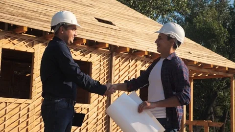 Teamwork. concept building constructing architect slow motion video. two men Stock Footage 115983461