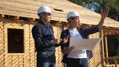 Teamwork. concept building constructing architect slow motion video. two men Stock-Footage 115984136