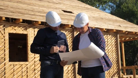 Teamwork. concept building constructing architect slow motion video. two men Video stock 117120159