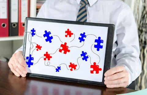 Teamwork concept on a clipboard Stock-Fotos