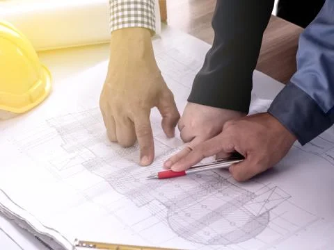 Teamwork concept, Engineer and workers discussing project of new building. ,T Stock Photos