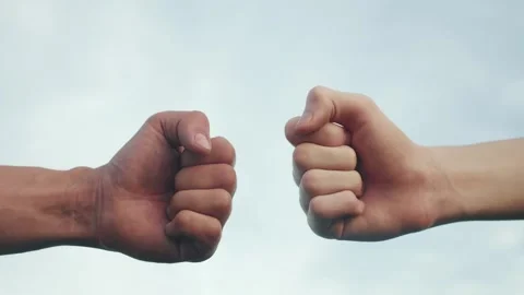 Teamwork concept. fist to fist commit solidarity respect and brotherhood gesture Video stock 164065697