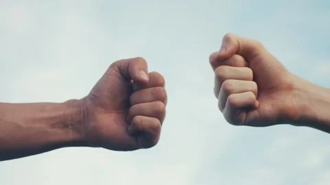 Teamwork concept. fist to fist commit solidarity a respect and brotherhood Video stock 166418304