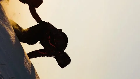 Teamwork concept. help you partner climb snowy mountain with backpack. hiking Stock Footage 264155787