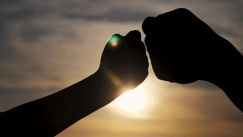 Teamwork concept. of a human hand with bumping fist. Friends Friendship Fist Stock Footage 119063095