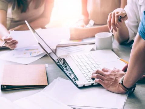 Teamwork concept. Startup Business plan discussing with digital and paperwork Stock Photos