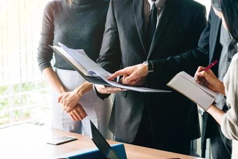 Teamwork concept. Startup Business plan discussing with digital and paperwork Stock Photos