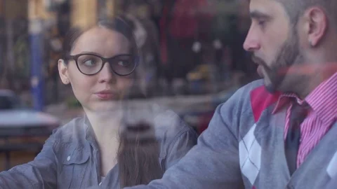 Teamwork, cooperation and creativity. Young business people meeting at cafe Stock-Footage 85224009