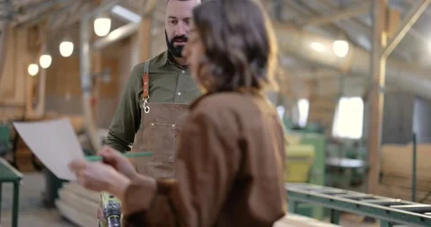 Teamwork of creative carpentry workers at the manufacturing Stock Footage 146913779