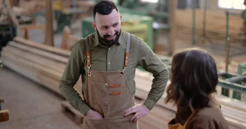 Teamwork of creative carpentry workers at the manufacturing Stock Footage 146914951