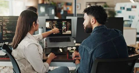 Teamwork, developer and coding training on computer screen in office for testing 写真素材