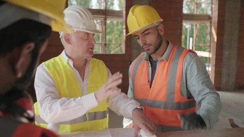 Teamwork With Engineer And Architect Talking To Construction Workers Stock Footage 98290708