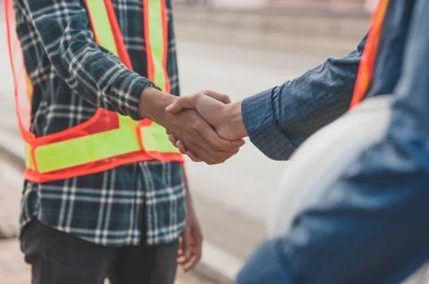 Teamwork Engineer shake hand agreement deal project construction success,Tech Stock Photos