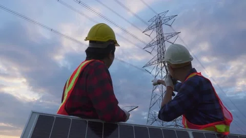Teamwork engineering in standard safety uniform solar panel inspect. Stock Footage 217912276