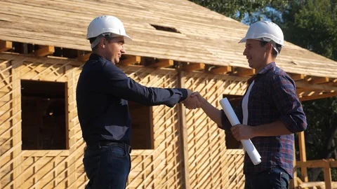 Teamwork handshake. concept building constructing architect slow motion video Stock Footage 115983827