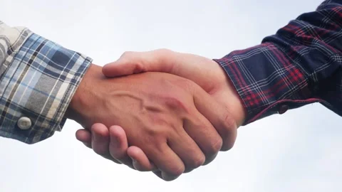 Teamwork handshake concept. two people shake lifestyle hands shaking hands Video stock 132596931