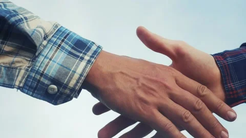 Teamwork handshake concept. two people shake hands shaking hands. different Video stock 151195783