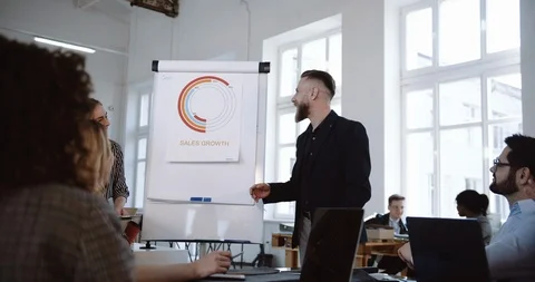 Teamwork at healthy workplace. Smiling middle aged sales coach man leading happy Stock-Footage 109539099