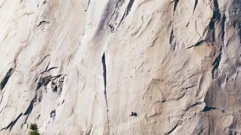 Teamwork helping hand travel of two strong rock climbers, male holding another 스톡 동영상 187934467