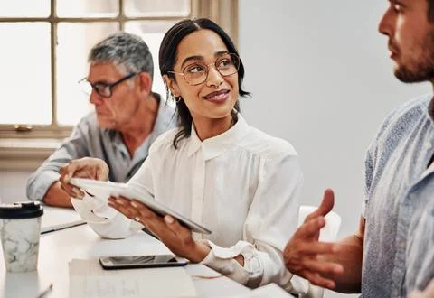 Teamwork makes a big difference in business. Shot of a group of businesspeople Stock Photos