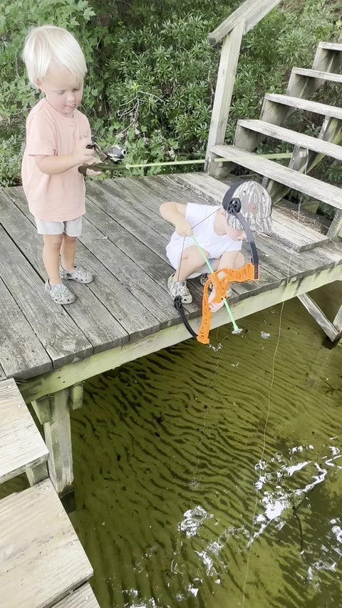 Teamwork makes the dream work, Lake Waccamaw, North Carolina - 28 Jul 2023 Stock Footage 247871965